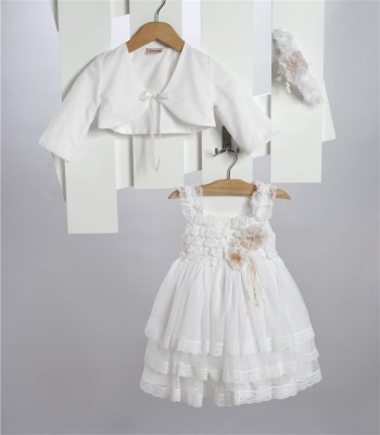 Άσπρο φόρεμα από τούλι στολισμένο με τούλινα λουλούδια και κορδελάκια.